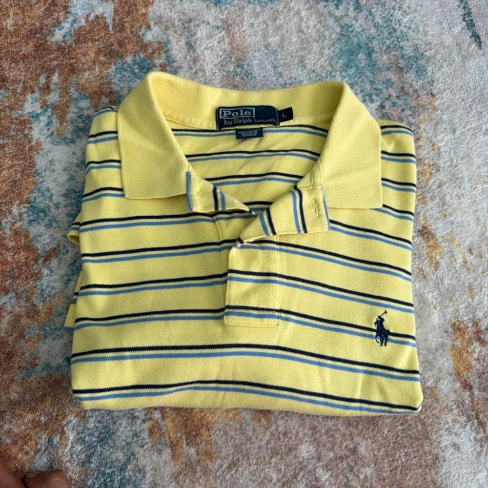 Yellow Polo Ralph Lauren polo shirt with horizontal black stripes.